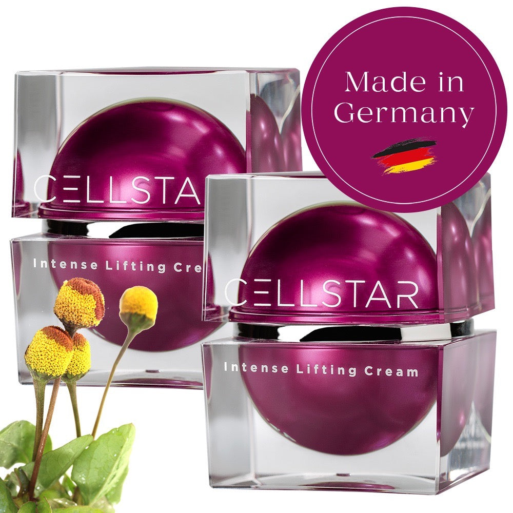 Das Bild zeigt zwei Cellstar Intense Lifting Creams in stilvollem magentafarbenen Tiegel mit dem Hinweis "Made in Germany". Die Creme bietet eine einzigartige Wirkstoffkombination, die gegen alle Arten von Falten wirkt, die Gesichtskontur festigt, Pigmentflecken verschwinden lässt und die Haut intensiv mit Feuchtigkeit versorgt. Neben der Creme ist eine Pflanze abgebildet, die natürliche Inhaltsstoffe symbolisiert.